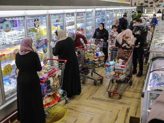 March 22, 2020, Gaza City, The Gaza Strip, Palestine: Palestinians at supermarket in Gaza city, Markets of the Gaza strip are witnessing an increase in demand after announce first two cases of coronavirus in the Gaza Strip. Gaza City Palestine - ZUMAq100 20200322_zaa_q100_041 Copyright: xAbedxAlrahmanxAlkahloutx