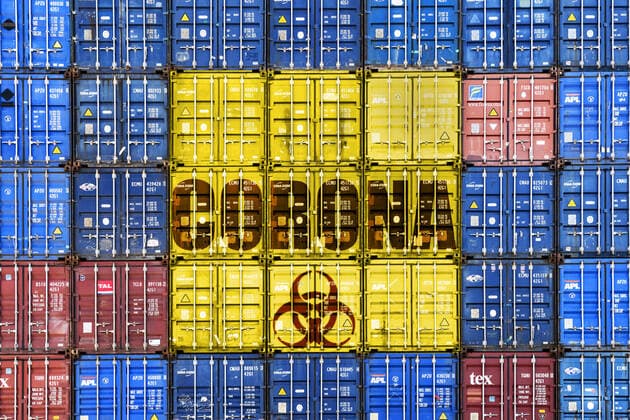 FOTOMONTAGE, Gestapelte Container mit Schriftzug Corona und BiogefÃ¤hrdungszeichen, Thema Coronavirus und Wirtschaftskrise
