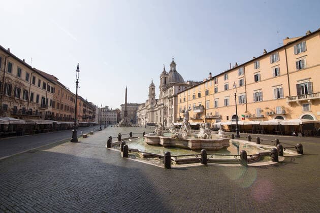 Rome: Italian flag on church in days of COVID-19 View of Piazza Navona without people, on the morning of Sunday 22 March 2020, during the Covid-19 pandemic Roma Italy Copyright: MatteoxNardone