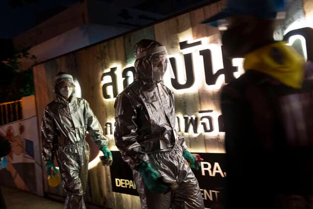 March 22, 2020, Bangkok, Bangkok, Thailand: Members of the Royal Thai Army have conducted sanitization activities in Bangkok nightly since March 19th in an effort to slow the spread of the Covid-19 virus, descending on areas of the city that see heavy pedestrian traffic. Wearing protective suits the soldiers and volunteers spray the sidewalks with chemical disinfectant and also clean high touch surfaces such as guard rails and ATM machines. Thailand s number of confirmed Covid-19 cases rose to 599, an increase of 188 from the day prior, the largest 1 day increase the country has seen so far. Bangkok Thailand - ZUMAt128 20200322_zap_t128_002 Copyright: xAdryelxTalamantesx