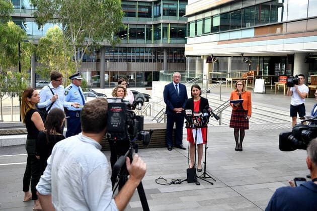 GLADYS BEREJIKLIAN CORONAVIRUS PRESSER, NSW Premier Gladys Berejiklian (centre) NSW Minister for Health Brad Hazzard (left) and NSW Chief Health Officer Dr Kerry Chant speak to the media in Sydney, Monday, March 23, 2020. The state of NSW is shutting down all non-essential services to slow the rapidly spreading coronavirus but schools will stay open for now. ( NO ARCHIVING, EDITORIAL USE ONLY, NO USE IN BOOKS WITHOUT CONSENT SYDNEY NSW AUSTRALIA  Copyright: xJOELxCARRETTx 20200323001458834319