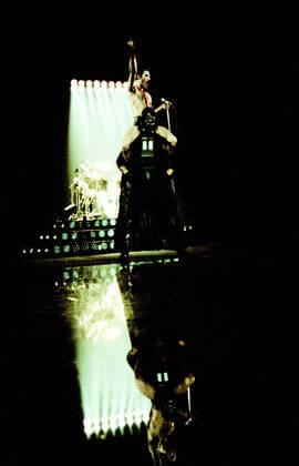 DETROIT, MI - SEPTEMBER 20: British singer and lead vocalist Freddie Mercury (1946-1991) sits on the shoulders of the Star Wars character Darth Vader while performing on stage during The Game Tour on September 20, 1980 at Joe Lous Arena in Detroit, Michigan. Copyright: xRossxMarinoxArchivex xMediaPunchx