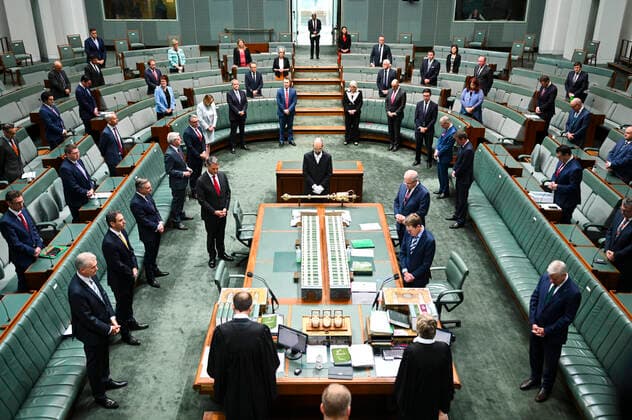 CORONAVIRUS LEGISLATION PARLIAMENT, Members of the Federal Parliament pray as they attend a sitting under rules of social distancing in the House of Representatives at Parliament House in Canberra, Monday, March 23, 2020. ( NO ARCHIVING, EDITORIAL USE ONLY, NO USE IN BOOKS WITHOUT CONSENT CANBERRA ACT AUSTRALIA  Copyright: xLUKASxCOCHx 20200323001458841277