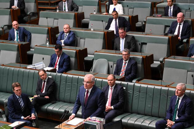 CORONAVIRUS LEGISLATION PARLIAMENT, Australian Prime Minister Scott Morrison speaks during a parliamentary sitting under rules of social distancing in the House of Representatives at Parliament House in Canberra, Monday, March 23, 2020. ( NO ARCHIVING, EDITORIAL USE ONLY, NO USE IN BOOKS WITHOUT CONSENT CANBERRA ACT AUSTRALIA  Copyright: xLUKASxCOCHx 20200323001458864342