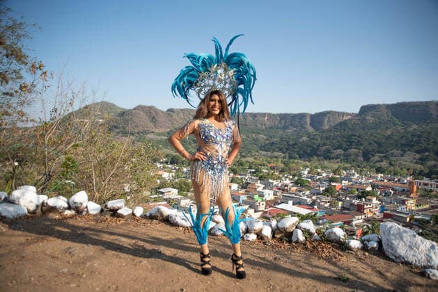March 22, 2020, Jalcomulco, Veracruz, Mo xico: Members of the LGBTTI court of the Jalcomulco carnival carry out an awareness and prevention campaign of COVID-19. The royal court is made up of a queen and princesses who dance and celebrate during the carnival through the streets of the town. This year, the party and carnival have been canceled to prevent some kind of contagion among the population, however, the court does not miss the opportunity to send a message to the residents to wash their hands and avoid leaving home. Jalcomulco MÃ xico - ZUMAqp1_ 20200322_zip_qp1_010 Copyright: xHectorxAdolfoxQuintanarxPerezx