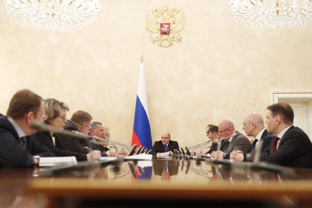 MOSCOW, RUSSIA - MARCH 23, 2020: Russia s Prime Minister Mikhail Mishustin (C) during a meeting with his deputies at the House of the Russian Government. Dmitry Astakhov POOL TASS  TS0D3128