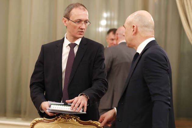 MOSCOW, RUSSIA - MARCH 23, 2020: Russia s Deputy Prime Minister - Russian Government Chief of Staff Dmitry Grigorenko (L) and Russia s Finance Minister Anton Siluanov ahead of a meeting between Russia s Prime Minister Mikhail Mishustin and his deputies at the House of the Russian Government. Dmitry Astakhov POOL TASS  TS0D3130