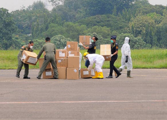 September 5, 2019, Jakarta, Jakarta, Indonesia: Indonesian Air Force C130 Hercules aircraft carrying COVID-19 medical devices from Shanghai, China, arrived at Halim Perdanakusuma Air Force Base, Jakarta on March, 23,2020. The medical devices consist of disposable masks, N95 masks, protective clothing, goggles, gloves, shoe covers, infrared thermometers, and surgical caps, to combat Corona Virus in Indonesia. Jakarta Indonesia - ZUMAr173 20190905_zip_r173_292 Copyright: xDasrilxRoszandix
