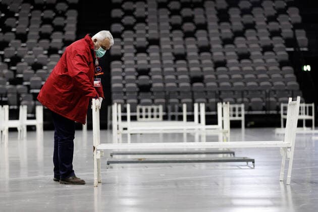 Split: Volunteers of the Red Cross began setting up beds in Spaladium Arena 23.03.2020., Croatia, Split - Red Cross volunteers begin setting up beds in the Spaladium arena, which will serve as a reception center for coronavirus patients in the Split-Dalmatia County. MilanxSabic PIXSELL
