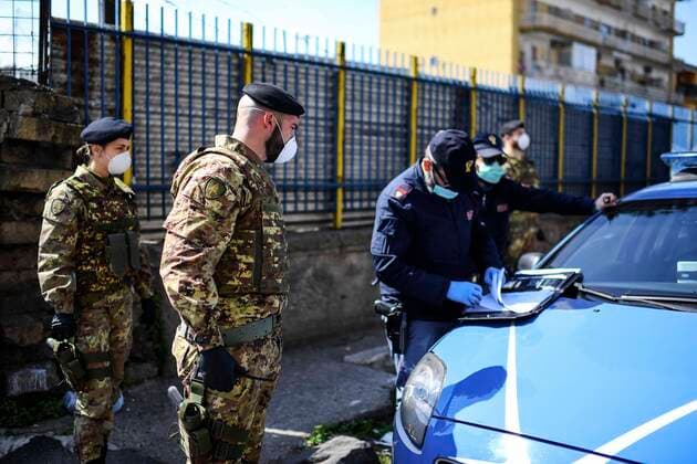 Italian Army soldiers and police jointly patrol the streets in a Naples neighborhood after the Italian government decided to deploy troops to check the compliance with the general lockdown and the pandemic of the coronavirus which causes the Covid-19 disease is not showing any sign of slowing down in the country.  Copyright: xSalvatorexLaportax xIPAx xKontrolabx