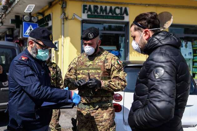 Italian Army soldiers and police jointly patrol the streets in a Naples neighborhood after the Italian government decided to deploy troops to check the compliance with the general lockdown and the pandemic of the coronavirus which causes the Covid-19 disease is not showing any sign of slowing down in the country.  Copyright: xSalvatorexLaportax xIPAx xKontrolabx