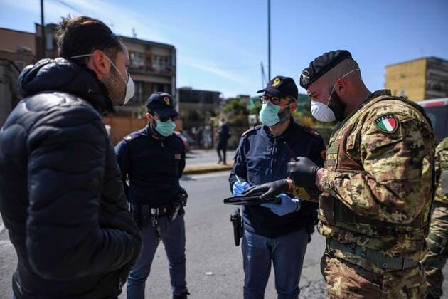 Italian Army soldiers and police jointly patrol the streets in a Naples neighborhood after the Italian government decided to deploy troops to check the compliance with the general lockdown and the pandemic of the coronavirus which causes the Covid-19 disease is not showing any sign of slowing down in the country.  Copyright: xSalvatorexLaportax xIPAx xKontrolabx