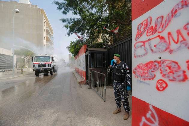 (200323) -- BEIRUT, March 23, 2020 -- Photo taken on March 23, 2020 shows a vehicle sterilizing a street in Beirut, Lebanon. Lebanon s Health Ministry announced on Monday that the number of COVID-19 confirmed cases in the country has risen to 256, the National News Agency reported. Security forces were deployed all over Lebanon to control the movement of people after the tough measures announced by the Lebanese government a day earlier. (Photo by Bilal Jawich Xinhua) LEBANON-BEIRUT-COVID-19 LixLiangyong 