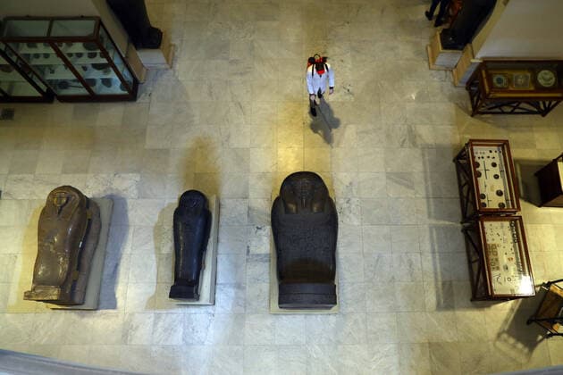 (200323) -- CAIRO, March 23, 2020 -- A man sprays disinfectant at the Egyptian Museum in downtown Cairo, Egypt, March 23, 2020. Egypt confirmed on Sunday 33 new COVID-19 cases, raising the total cases in the country to 327, the Egyptian Health Ministry said in a statement. The Egyptian Ministry of Tourism and Antiquities announced on Saturday the shutting down of all museums and archeological sites and attractions nationwide from March 23 to 31 for sterilization. (Photo by Ahmed Gomaa Xinhua) EGYPT-CAIRO-EGYPTIAN MUSEUM-COVID-19-MEASURES WuxHuiwo 