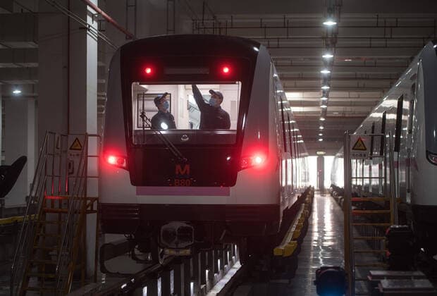 (200323) -- WUHAN, March 23, 2020 -- Staff overhaul a subway train at a train depot in Wuhan, central China s Hubei Province, March 23, 2020. Wuhan is making preparations for restoring the operation of public transportation. The public need to go through real-name registration for taking public transportation or taxis in Wuhan, capital of central China s Hubei Province, authorities said Sunday. ) CHINA-HUBEI-WUHAN-PUBLIC TRANSPORTATION SYSTEM-PREPARATION-OPERATION RESTORATION (CN) XiaoxYijiu 