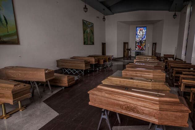 Cremona. Church used as a waiting room for coffins at the Cremona Hospital emergency COVID19 Coronavirus (Carlo Cozzoli Fotogramma, Cremona - 2020-03-23) p.s. la foto e utilizzabile nel rispetto del contesto in cui e stata scattata, e senza intento diffamatorio del decoro delle persone rappresentate  Copyright: xCarloxCozzolix xFOTOGRAMMAx