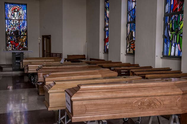 Cremona. Church used as a waiting room for coffins at the Cremona Hospital emergency COVID19 Coronavirus (Carlo Cozzoli Fotogramma, Cremona - 2020-03-23) p.s. la foto e utilizzabile nel rispetto del contesto in cui e stata scattata, e senza intento diffamatorio del decoro delle persone rappresentate  Copyright: xCarloxCozzolix xFOTOGRAMMAx