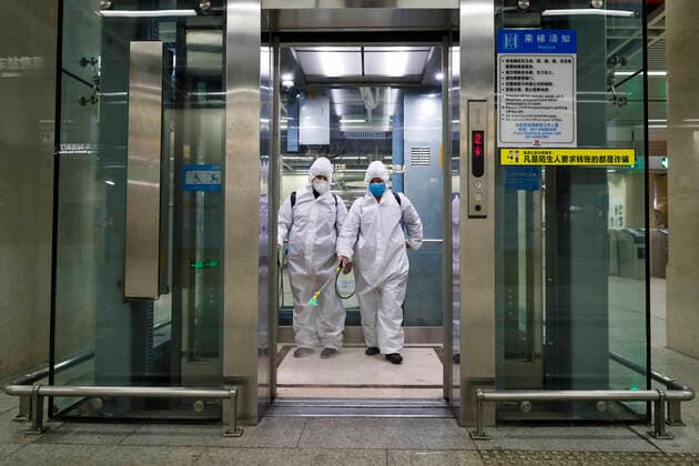 (200323) -- WUHAN, March 23, 2020 -- Staff members conduct disinfection at the elevator of the subway station of Hankou Railway Station in Wuhan, central China s Hubei Province, March 23, 2020. Wuhan is making preparations for restoring the operation of public transportation. The public need to go through real-name registration for taking public transportation or taxis in Wuhan, capital of central China s Hubei Province, authorities said Sunday. ) CHINA-HUBEI-WUHAN-PUBLIC TRANSPORTATION SYSTEM-PREPARATION-OPERATION RESTORATION (CN) ShenxBohan 