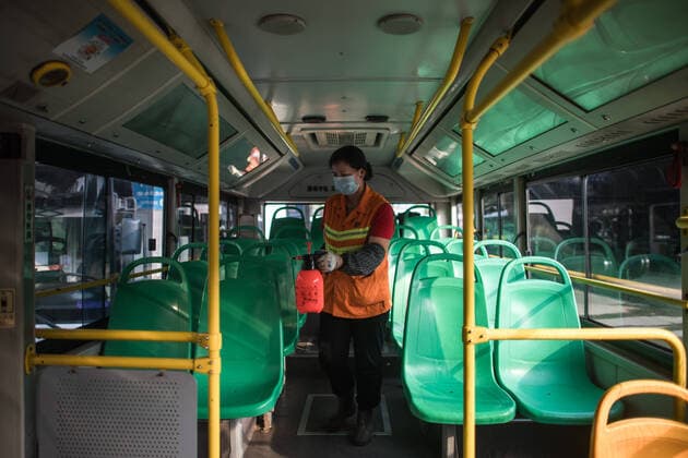 (200323) -- WUHAN, March 23, 2020 -- Zhao Zhenxiang of Wuhan public transportation group disinfects a bus at the bus terminal in Wuhan, central China s Hubei Province, March 23, 2020. Wuhan is making preparations for restoring the operation of public transportation. The public need to go through real-name registration for taking public transportation or taxis in Wuhan, capital of central China s Hubei Province, authorities said Sunday. ) CHINA-HUBEI-WUHAN-PUBLIC TRANSPORTATION SYSTEM-PREPARATION-OPERATION RESTORATION (CN) XiaoxYijiu 