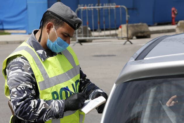 March 23, 2020, Beirut, Lebanon: Lebanese policeman wearing a mask as a means of protection against the coronavirus COVID-19. For most people, the new coronavirus causes only mild or moderate symptoms. For some it can cause more severe illness Beirut Lebanon - ZUMAews 20200323_mda_ap3_116 Copyright: xMarwanxTahtahx
