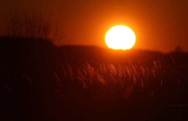 IVANOVO REGION, RUSSIA - MARCH 23, 2020: A view of the setting sun in the town of Vichuga. Vladimir Smirnov TASS  TS0D3290