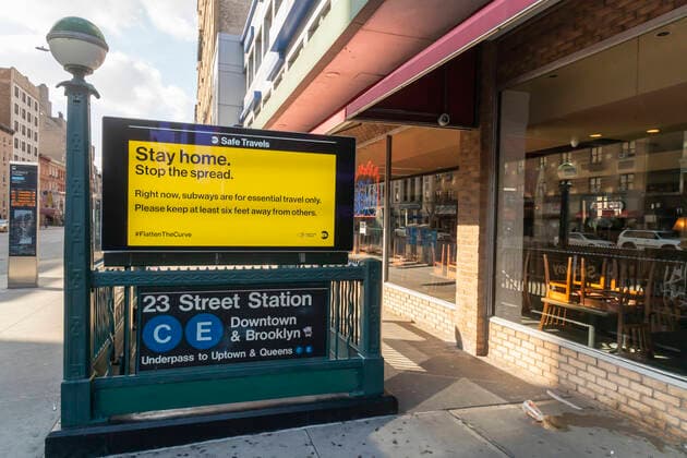 New York during the COVID-19 pandemic A digital kiosk at the subway entrance in Chelsea in New York on Sunday, March 22, 2020 displays information related to social distancing due to the COVID-19 pandemic. (  RichardxB.xLevine