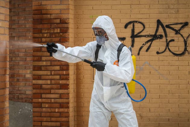 March 23, 2020: March 23, 2020 (Malaga ) The Spanish Military Unit UME, has carried out disinfection tasks at the main bus station in Malaga, to prevent the spread of the Coronavirus due to the passenger traffic that passes daily through the station. The Spanish military use bleach to clean up the surrounding area. - ZUMAc161 20200323_zap_c161_005 Copyright: xLorenzoxCarnerox