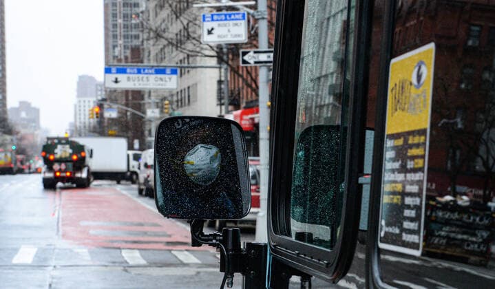March 23, 2020, New York Manhattan, USA: Bus driver wearing mask driving MTA bus through the empty streets of NYC. After NYC Authorities ordered to stay New Yorkers to stay home except for those providing essential services. 03 23 20. New York Manhattan 1AV and 87 ST . . New York Manhattan USA - ZUMAs252 20200323_znp_s252_038 Copyright: xMarcusxSantosx