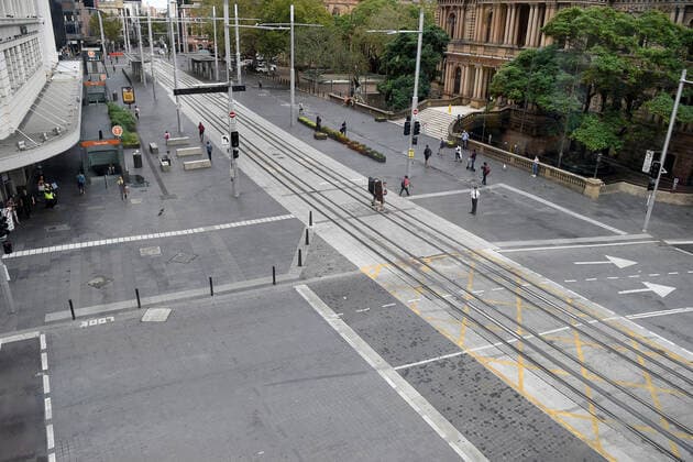SYDNEY CORONAVIRUS COVID-19, A near empty intersection is seen in front of Town Hall Sydney, Tuesday, March 24, 2020. A shutdown of non-essential services is in effect Australia wide in a bid to slow the spread of the coronavirus (COVID-19) disease, with the state of NSW recording 818 positive tested cases. ( NO ARCHIVING, EDITORIAL USE ONLY, NO USE IN BOOKS WITHOUT CONSENT SYDNEY NSW AUSTRALIA  Copyright: xBIANCAxDExMARCHIx 20200324001459042694