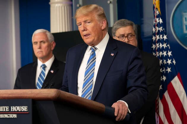 United States President Donald J. Trump makes remarks as he participates in a news briefing by members of the Coronavirus Task Force in the Brady Press Briefing Room at the White House in Washington, DC on Monday, March 23, 2020. At left is US Vice President Mike Pence. Copyright: xChrisxKleponisx