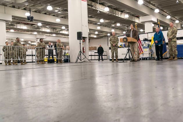 March 23, 2020, New York, United States: New York Governor Andrew Cuomo speaks to the media and members of the National Guard at the Jacob K. Javits Convention Center in New York City. .The Javits Convention Center is being turned into a hospital to help fight coronavirus cases as part of New York state request for assistance to the federal government for four field hospital sites and aid from the U.S. Army Corps of Engineers. New York has been one of the hardest hit states in the nation with over 10,000 cases of COVID-19. New York United States - ZUMAs197 20200323_zaa_s197_109 Copyright: xRonxAdarx