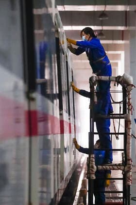 (200324) -- WUHAN, March 24, 2020 -- Staff clean a subway train at a subway train depot in Wuhan, central China s Hubei Province, March 23, 2020. The public need to go through real-name registration for taking public transportation or taxis in Wuhan, capital of central China s Hubei Province, authorities said Sunday. ) CHINA-HUBEI-WUHAN-PUBLIC TRANSPORTATION SYSTEM-PREPARATION-OPERATION RESTORATION (CN) ShenxBohan 