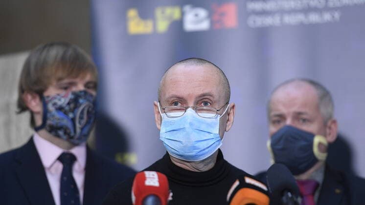 L-R Czech Health Minister Adam Vojtech, doctor Vladimir Cerny and Deputy Health Minister and Central Crisis Staff head Roman Prymula with a protection face masks attend a press conference on assessment of development of COVID-19 illness, on March 24, 2020, in Prague, Czech Republic. (CTKxPhoto OndrejxDeml) CTKPhotoP202003240202601 _DML8715