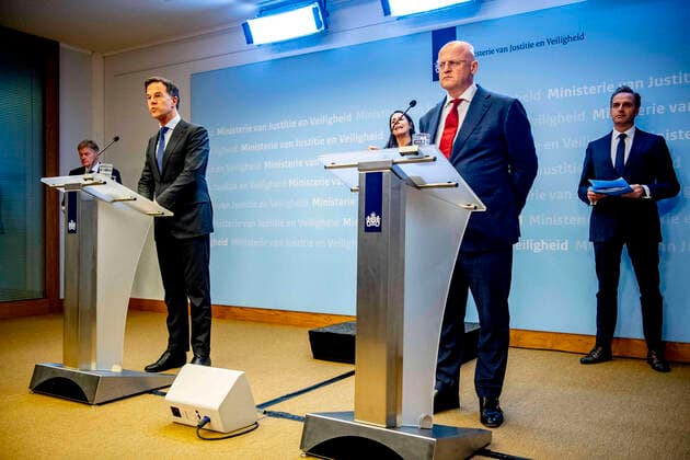 March 23, 2020, The Hague, Netherlands: Prime Minister Mark Rutte and Minister of Justice and Security (CDA) Ferdinand Grapperhaus attend a press conference about COVID-19 outbreak..Netherlands Health Ministry recorded a total of 4,749 infections, 213 death and 2 recovered since the beginning of the outbreak. The Hague Netherlands - ZUMAs197 20200323_zaa_s197_135 Copyright: xRobinxUtrechtx