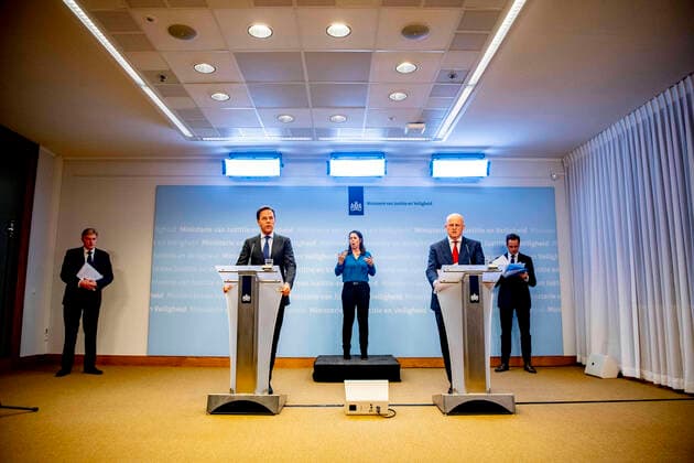 March 23, 2020, The Hague, Netherlands: Prime Minister Mark Rutte and Minister of Justice and Security (CDA) Ferdinand Grapperhaus attend a press conference about COVID-19 outbreak..Netherlands Health Ministry recorded a total of 4,749 infections, 213 death and 2 recovered since the beginning of the outbreak. The Hague Netherlands - ZUMAs197 20200323_zaa_s197_138 Copyright: xRobinxUtrechtx