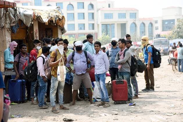 PATNA, INDIA - MARCH 23: Commuters seen at Mithapur Bus stand during the first day of lockdown imposed by the state government to curb the spread of coronavirus on March 23, 2020 in Patna, India. (Photo Santosh Kumar Hindustan Times) First day Of Lockdown In Patna