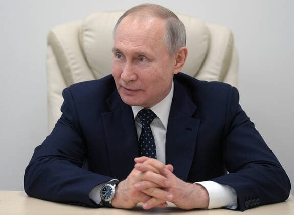 MOSCOW, RUSSIA - MARCH 24, 2020: Russia s President Vladimir Putin on his visit to the Novomoskovsky multipurpose medical center for patients suspected of the COVID-19 coronavirus infection. Alexei Druzhinin Russian Presidential Press and Information Office TASS  TS0D337E