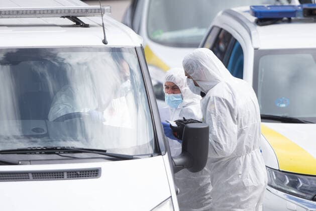 March 24, 2020, Madrid, MADRID, SPAIN: Details of the movements of security officers in the morgue installed in the Ice Palace during tennth day after the Government declared the state of alarm in Spain and recommended people to stay at home to fight coronavirus COVID-19 on March 24, 2020 in Madrid, Spain Madrid SPAIN - ZUMAa181 20200324_zaa_a181_095 Copyright: xJoaquinxCorcherox