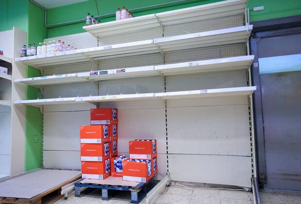 Supermarket in Marktoberdorf, March 24, 2020. Empty shelves of food, milk due to the Corona virus disease (COVID-19) on March 24, 2020 in Marktoberdorf, Germany