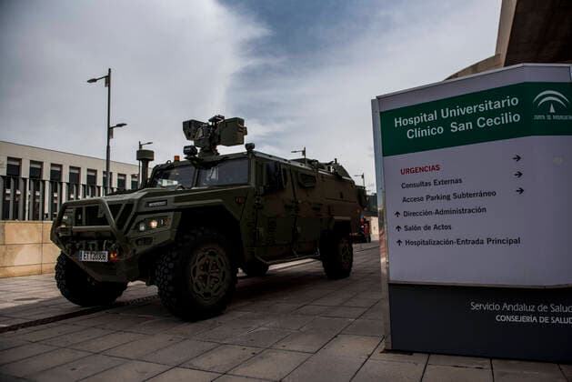 March 24, 2020, Granada, Spain: An army vehicle at the San Cecilio clinical hospital during the covid-19 pandemic..After 11 days of the state of emergency in Spain due to the coronavirus outbreak, there are more than 29,900 infected and 2,700 deaths. Granada Spain - ZUMAs197 20200324_zaa_s197_035 Copyright: xCarlosxGilx