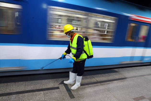 (200324) -- CAIRO, March 24, 2020 -- A man sprays disinfectant in a metro station in Cairo, Egypt, March 24, 2020. Egypt, a country with a population of 100 million people, has confirmed 366 COVID-19 cases, including 19 deaths. (Photo by Ahmed Gomaa Xinhua) EGYPT-CAIRO-METRO-COVID-19-MEASURES WuxHuiwo 