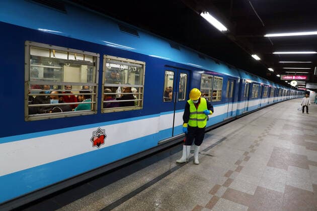 (200324) -- CAIRO, March 24, 2020 -- A man sprays disinfectant in a metro station in Cairo, Egypt, March 24, 2020. Egypt, a country with a population of 100 million people, has confirmed 366 COVID-19 cases, including 19 deaths. (Photo by Ahmed Gomaa Xinhua) EGYPT-CAIRO-METRO-COVID-19-MEASURES WuxHuiwo 