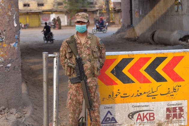 Pakistani army and ranger officials patrolling Pakistani army and ranger officials are patrolling high alert during the complete lockdown due to increasing coronavirus cases in country, as preventive measure against the spread of the Coronavirus (COVID- 19) in Lahore. Pakistan on Tuesday reported its seventh death from the novel coronavirus in the country and 16 new cases taking the nationwide toll of positive cases to 908. Pakistani authorities said they d shut down train, bus operations across the country until March 31 in an effort to contain the spread of the virus. Lahore Punjab Pakistan Copyright: RanaxSajidxHussain