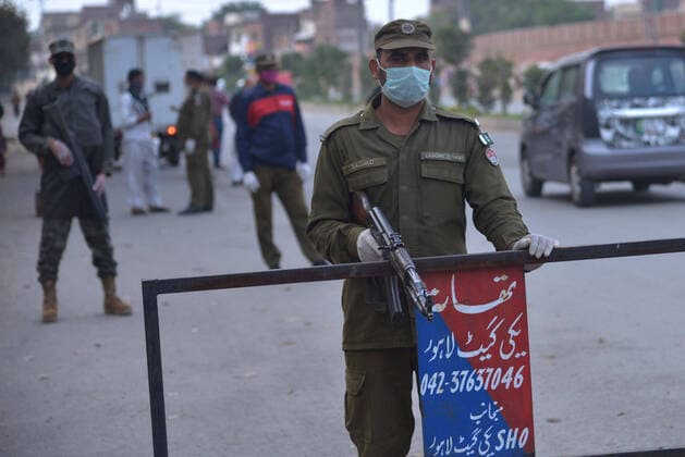 Pakistani army and ranger officials patrolling Pakistani army and ranger officials are patrolling high alert during the complete lockdown due to increasing coronavirus cases in country, as preventive measure against the spread of the Coronavirus (COVID- 19) in Lahore. Pakistan on Tuesday reported its seventh death from the novel coronavirus in the country and 16 new cases taking the nationwide toll of positive cases to 908. Pakistani authorities said they d shut down train, bus operations across the country until March 31 in an effort to contain the spread of the virus. Lahore Punjab Pakistan Copyright: RanaxSajidxHussain