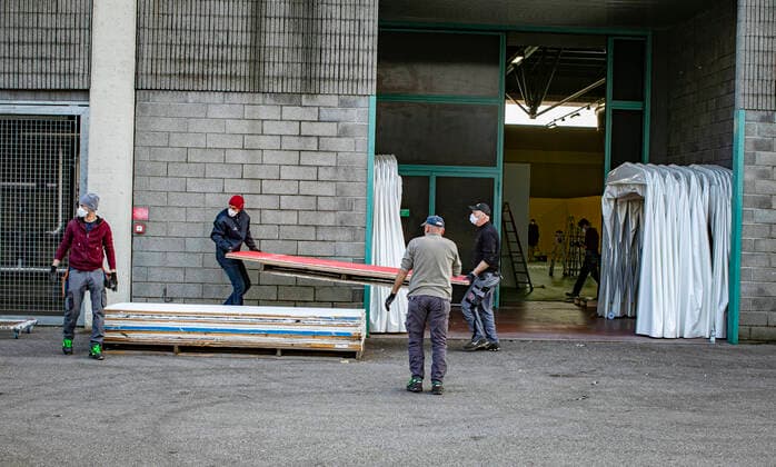 Bergamo Coronavirus - work on the construction of the hospital in Campo dell ANA (national alpine association) in the Fair area continues; (Foto & xa9;Sergio Agazzi Fotogramma, Bergamo - 2020-03-24) p.s. la foto e utilizzabile nel rispetto del contesto in cui e stata scattata, e senza intento diffamatorio del decoro delle persone rappresentate  Copyright: xFotox& xa9;SergioxAgazzix xFOTOGRAMMAx