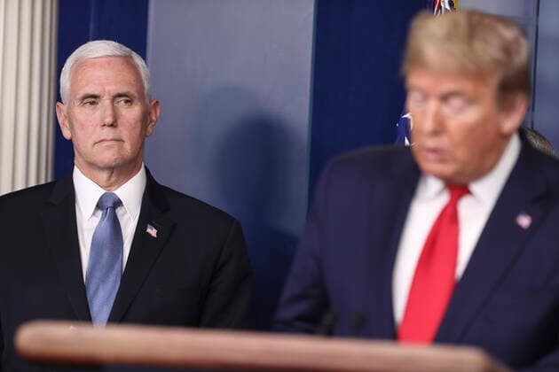 March 25, 2020, Washington, District of Columbia, USA: United States Vice President Mike Pence, left, listens as US President Donald J Trump speaks during a press conference with members of the coronavirus task force in the Brady Press Briefing Room of the White House on March 24, 2020 in Washington, DC Washington USA - ZUMAs152 20200325_zaa_s152_013 Copyright: xOliverxContrerasx