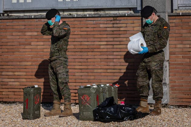 March 24, 2020, San Sebastian, Basque Country, Spain: Members of the Spanish army wearing face masks as a preventive measure, doing disinfection work during the corona virus pandemic..62 soldiers from the Spanish Army disinfected the San Sebastian train station in the Basque County, as a preventive measure against the spread of the coronavirus San Sebastian Spain - ZUMAs197 20200324_zaa_s197_148 Copyright: xJavixJuliox