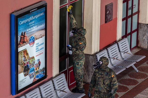 March 24, 2020, San Sebastian, Basque Country, Spain: Several soldiers from the Spanish army carry out disinfection work at the San Sebastian train station, to slow down the expansion of Covid 19. ..A device made up of 62 soldiers from the Spanish Army disinfected the train station in San Sebastian, a city in the Basque Country, Spain, on Tuesday, as a preventive measure against the spread of the coronavirus COVID-19..during the corona virus pandemic..Soldiers doing disinfection work during the corona virus pandemic..62 soldiers from the Spanish Army disinfected the San Sebastian train station in the Basque County, as a preventive measure against the spread of the coronavirus San Sebastian Spain - ZUMAs197 20200324_zaa_s197_154 Copyright: xJavixJuliox