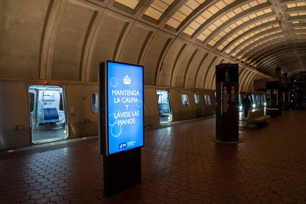 March 24, 2020, Bethesda, MD, UNITED STATES: Nearly empty metro cars open up as a sign informing people how to keep safe reads Ã Stay Calm and Wash Your Hands at the Medical Center Metro station in mid day in Bethesda, MD on Tuesday, March 24, 2020. To date the United States has 52,966 Corona Virus cases and 685 deaths. President Donald Trump says he wants the nation opened up and just raring to go by Easter -- a date just more than two weeks away that few health experts believe will be sufficient in containing the spread of coronavirus. Bethesda UNITED STATES - ZUMAc206 20200324_zap_c206_010 Copyright: xKenxCedenox