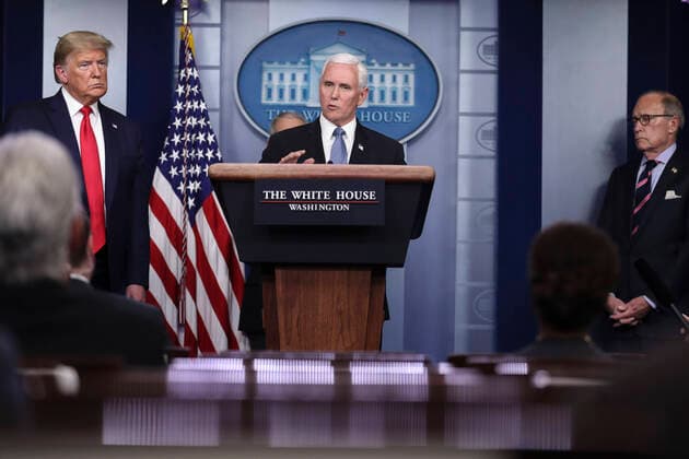 March 25, 2020, Washington, District of Columbia, USA: United States Vice President Mike Pence, right, speaks as US President Donald J. Trump, left, listens during a press conference with members of the coronavirus task force in the Brady Press Briefing Room of the White House on March 24, 2020 in Washington, DC. Standing at far right is Director of the National Economic Council Larry Kudlow Washington USA - ZUMAs152 20200325_zaa_s152_047 Copyright: xOliverxContrerasx